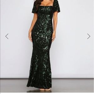 Emerald green formal dress. I bought it as a back up for my daughters wedding.